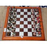 COMPOSITION MEDIEVAL CHESS SET WITH BOARD