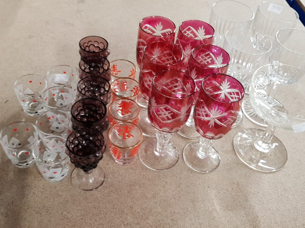 LOT OF 4 CRYSTAL CUT WINE GLASSES AND 6 FLASHED RED CUT WINE GLASSES PLUS VARIOUS SHOT GLASSES WHICH