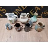 STUDIO POTTERY JUGS TO INCLUDE BUCHAN PRINKNASH EWENNY POTTERY SYL MACRO ETC