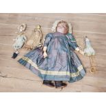 AN EARLY 20TH CENTURY COMPOSITE DOLL STAMPED 8 TO NECK TOGETHER WITH TWO SMALLER IN DISTRESSED