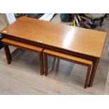 TEAK NEST OF THREE TABLES, COFFEE TABLE AND MATCHING PAIR OF LAMP TABLES