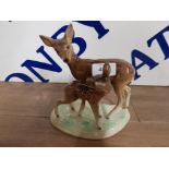 A WESTERN GERMANY CERAMIC GROUP OF A DEER AND FAWN NO 771