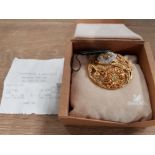 A SWAROVSKI BROOCH OF FLORAL DESIGN IN ORIGINAL BOX WITH RECEIPT