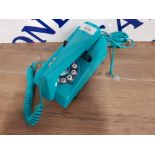 A VINTAGE STYLE TELEPHONE BY WILD AND WOLF LTD IN GREEN