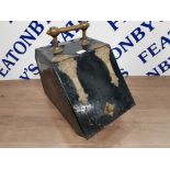 A VICTORIAN BLACK PAINTED METAL AND BRASS BOUND COAL SCUTTLE