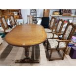 MID 20TH CENTURY OAK EXTENDING DINING TABLE AND CHAIRS BY OLD CHARM ONE SPARE LEAF AND A