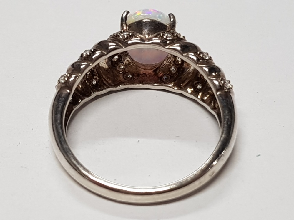 SILVER AND CZ RING WITH HUGE CREATED OPAL CENTRE STONE, 5G SIZE T - Image 3 of 4