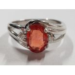 18CT WHITE GOLD ORANGE OVAL STONE AND 2 DIAMONDS RING, 4.6G SIZE N