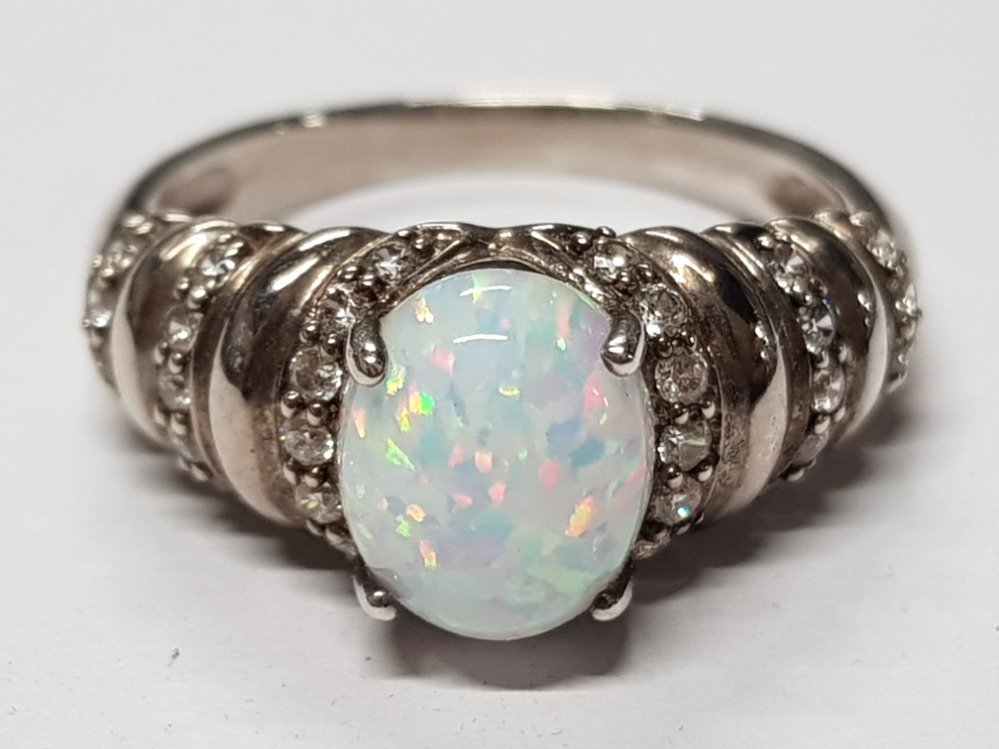 SILVER AND CZ RING WITH HUGE CREATED OPAL CENTRE STONE, 5G SIZE T
