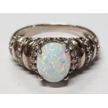 SILVER AND CZ RING WITH HUGE CREATED OPAL CENTRE STONE, 5G SIZE T