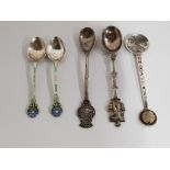 A PAIR OF SILVER AND ENAMEL COFFEE SPOONS (SAS) TOGETHER WITH THREE SOUVENIR SPOONS