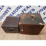 A VINTAGE CANVAS AND LEATHER BOUND TRAVELLING TRUNK INSCRIBED SCHOFIELD 51 X 41 X 41CM TOGETHER WITH