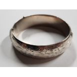 SILVER PATTERNED AND POLISHED BANGLE WITH SAFETY CHAIN 31.6G