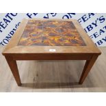 A 20TH CENTURY TEAK SQUARE OCCASIONAL TABLE WITH INSET TILES TO CENTRE 61CM SQUARED