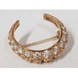 9CT GOLD AND CZ CRESCENT SHAPED BROOCH, 5.3G