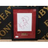 FRAMED SIDE PROFILE DRAWING OF A BOY BY MICHAEL JACKSON, ADDITIONALLY SIGNED BY THE MAN HIMSELF
