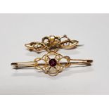 A VICTORIAN 9CT GOLD BROOCH WITH PURPLE STONE TOGETHER WITH A YELLOW METAL ONE 5.1G GROSS