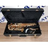 AN ELKHART SERIES II BRASS SAXOPHONE NO 9090289 BOXED