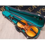 A VIOLIN AND BOW IN CARRY CASE