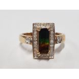 A 9CT YELLOW GOLD BLACK OPAL DOUBLET AND CZ RING SIZE N 2.9G GROSS