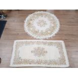 CIRCULAR SHAPED FLORAL PATTERNED FRINGED RUG DIAMETER 124CM, TOGETHER WITH MATCHING RECTANGULAR