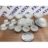 30 PIECE DINNER SET WITH BLACK AND BLUE DECORATIVE PATTERN