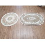 TWO MODERN CHINESE RUGS ONE CIRCULAR 92CM DIAMETER AND ONE OBLONG 123 X 80CM