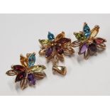 9CT YELLOW GOLD FLOWER CLUSTER EARRINGS AND PENDANT SET WITH GARNET, AMETHYST, PERIDOT, BLUE TOPAZ