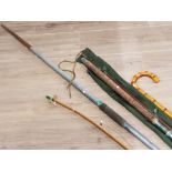 VINTAGE BOW AND JAVELIN TOGETHER WITH WALKING STICK AND MONARCH FISHING ROD WITH CARRY BAG