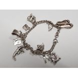 SILVER CHARM BRACELET WITH 10 CHARMS