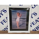 PHOTOGRAPHER ANDRE DE DIENES 1913-1985 FRAMED PHOTOGRAPH OF MARILYN MONROE IN A SEXY POSE IN
