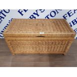 A WICKER BLANKET BASKET 69 X 35 X 34CM