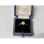 A 9CT GOLD FAUX PEARL AND WHITE STONE RING HALLMARKED SIZE 0 1.9G GROSS