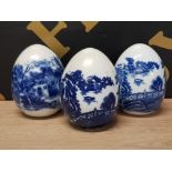 SET OF 3 BLUE AND WHITE PORCELAIN EGGS