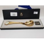 A SILVER GILT YEAR SPOON BY GEORGE JENSEN 1981 WITH ENAMEL FLOWER DECORATION 43.4G GROSS BOXED