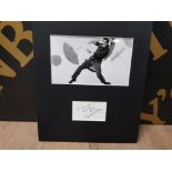 GENE KELLY 1912-1996 AUTOGRAPH ALONG WITH A SHOT OF SINGIN' IN THE RAIN