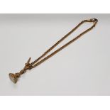 A VICTORIAN GILT METAL ALBERT CHAIN WITH T BAR AND SEAL 20CM INC FOB