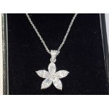 BOXED SILVER AND CZ FLOWER PENDANT AND CHAIN