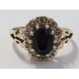 9CT YELLOW GOLD OVAL SAPPHIRE AND DIAMOND CLUSTER RING, 2.1G SIZE J
