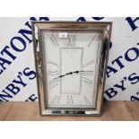 A MODERN WALL CLOCK BY HEPWORTH AND SON WITH BEVELLED GLASS DETAILING TO FRAME RETAILED BY NEXT 51 X