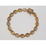 GOLD 9CT OPAL AND YELLOW STONE BRACELET, 13G