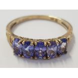 9CT YELLOW GOLD PURPLE 5 STONE RING, 1.8G SIZE M1/2