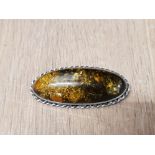 VINTAGE AMBER TYPE BROOCH WITH SILVER MOUNTS