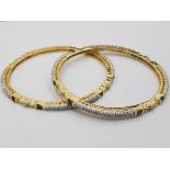 2 GOLD PLATED AND CZ SLAVE BANGLES