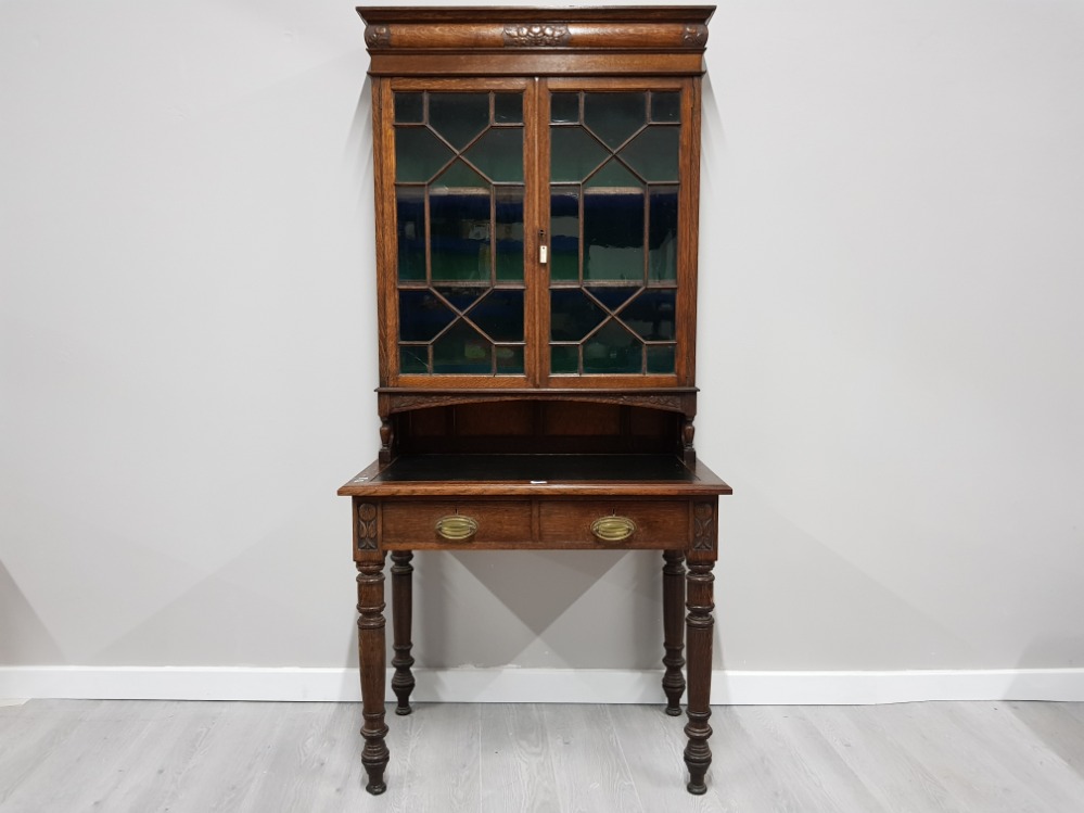 AN EARLY 20TH CENTURY OAK SECRETAIRE LEATHER TOP WITH GLAZED ASTRAGAL BOOKCASE ABOVE 94 X 196 X