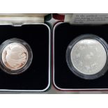 2 SILVER PROOF SILVER COINS INCLUDES 1995 2 POUND WWII COIN AND 1993 5 POUND SILVER COIN IN ORIGINAL