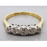 AN 18CT YELLOW GOLD AND PLATINUM FIVE STONE DIAMOND RING SIZE O 2.8G GROSS