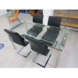 A JOHN LEWIS MODERN GLASS AND METAL DINING TABLE 160.5 X 76 X 80CM TOGETHER WITH FOUR BLACK
