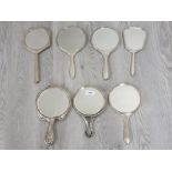 A GOOD COLLECTION OF 20TH CENTURY SILVER HAND-HELD BEVELLED VANITY MIRRORS ART NOUVEAU AND ART