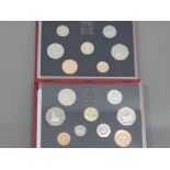 2 SETS OF COINS 1985 PROOF DELUXE LEATHER CASE PLUS ORIGINAL PACKING CONTAINING X 7 C.O.A AND A 1986